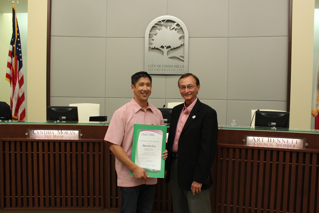 Photo of Darrin Lee, Volunteer of the Quarter and Mayor Ed Graham